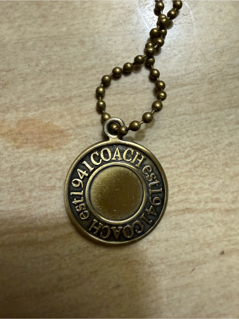 Coach Antique Gold Brass Round Logo Hangtag